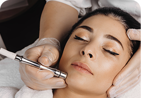 Woman receiving cosmetic laser treatment